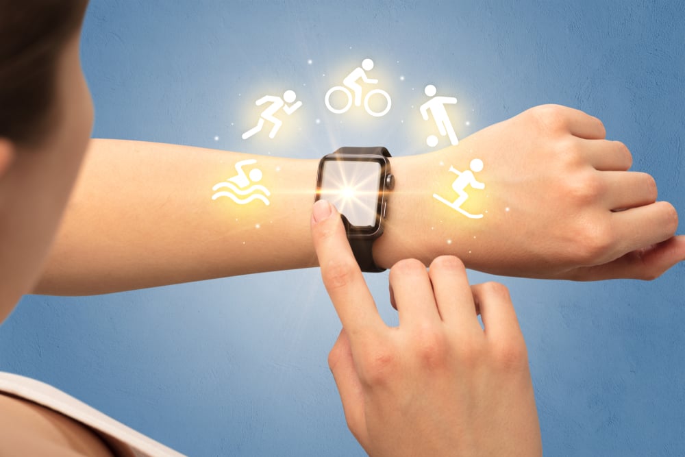 Female hand with smartwatch and sport concept.