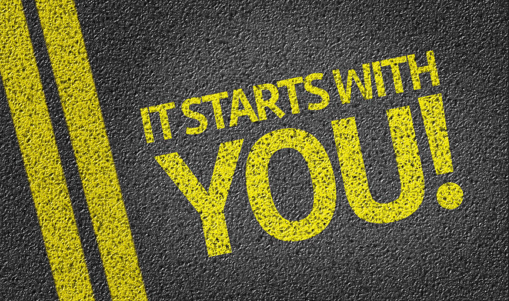It Starts With You! written on the road