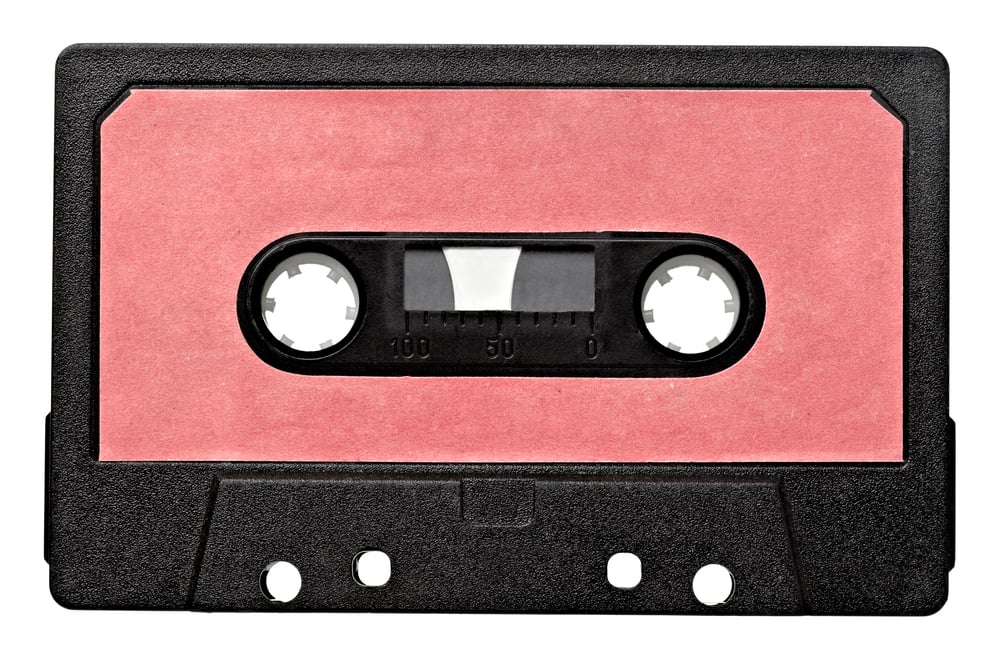 close up of vintage audio tape on white background with clipping path